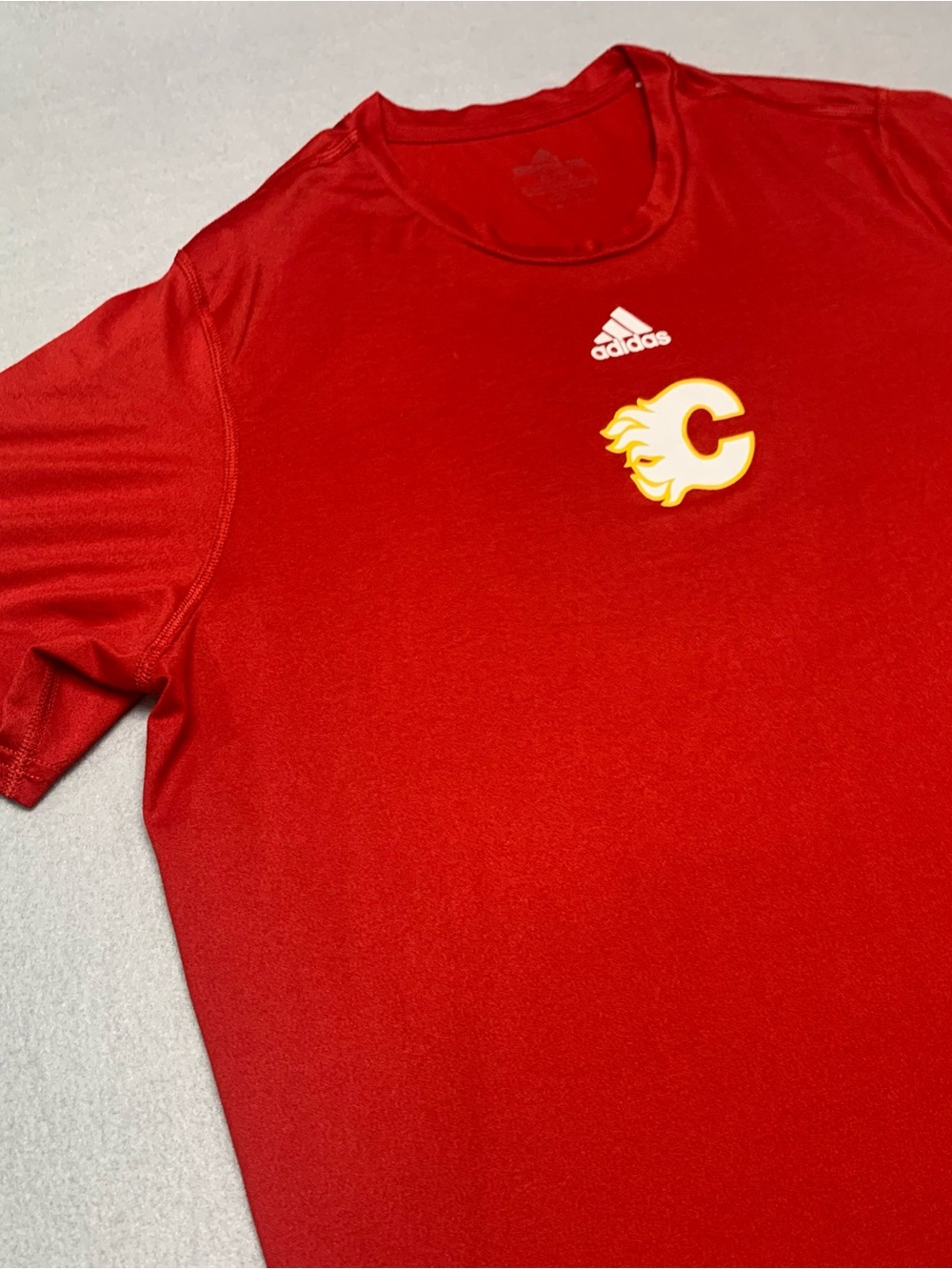 adidas Men’s Red Calgary Flames Logo Short Sleeve Crewneck